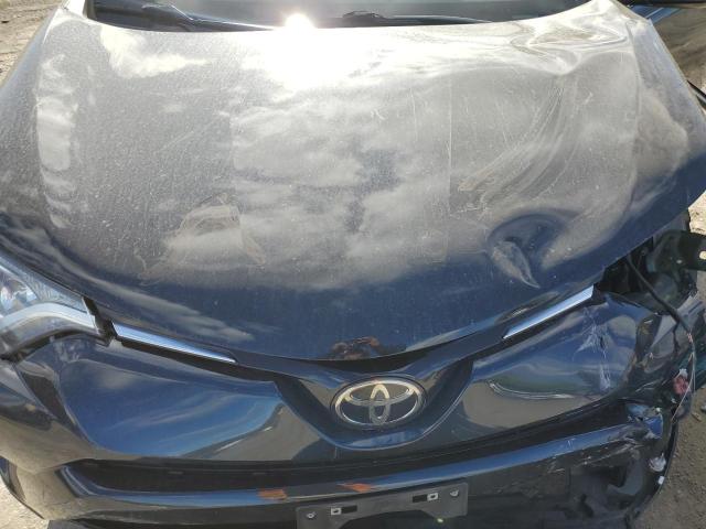 Photo 12 from auction – 2018 TOYOTA RAV4 LE with VIN 2T3BFREV6JW835355