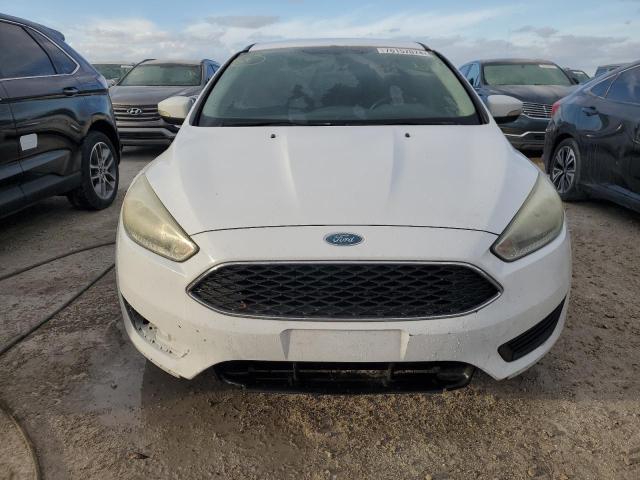 Photo 5 from auction – 2015 FORD FOCUS SE with VIN 1FADP3F23FL215201