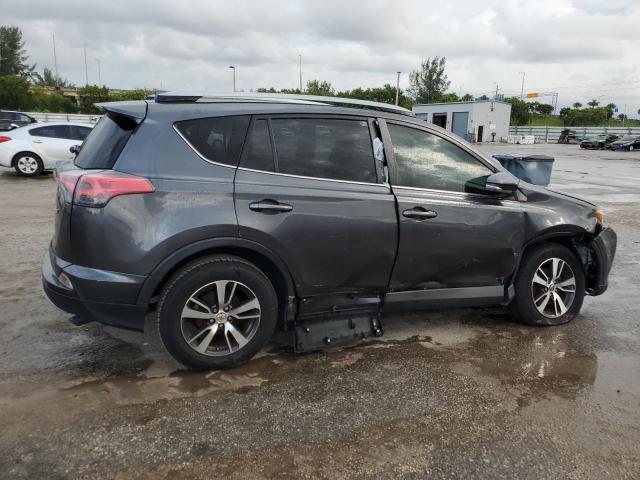 Photo 3 from auction – 2017 TOYOTA RAV4 XLE with VIN JTMWFREV2HD101868