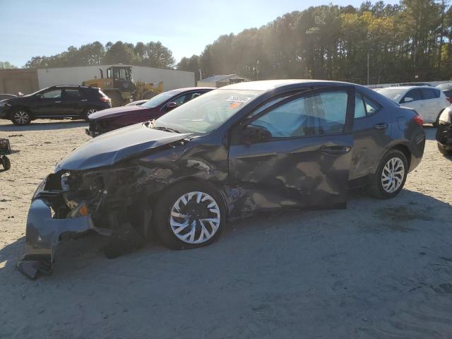 TOYOTA COROLLA L 2017 with VIN 5YFBURHE6HP620869 - Photo from auction