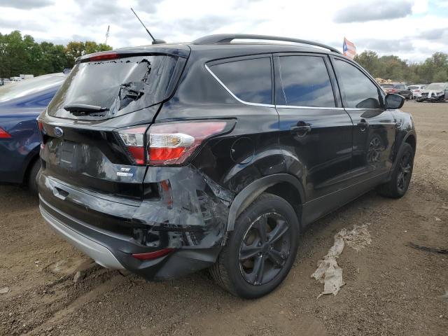 Photo 3 from auction – 2018 FORD ESCAPE SE with VIN 1FMCU9GDXJUB15791