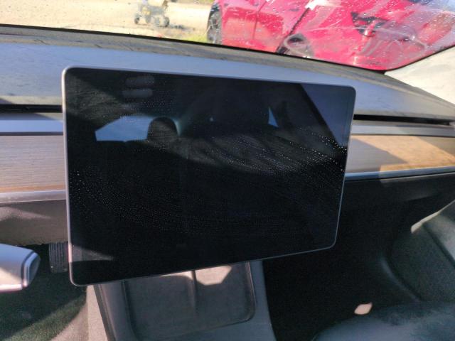 Photo 9 from auction – 2021 TESLA MODEL 3 with VIN 5YJ3E1EB2MF848158