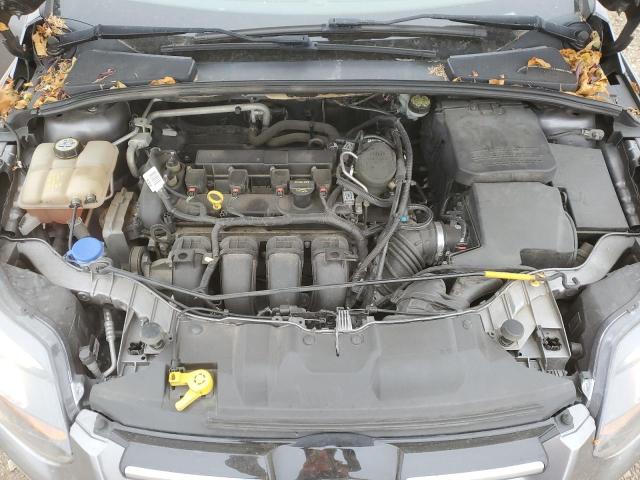 Снимка 11 от търг – 2013 FORD FOCUS TITA с VIN 1FADP3J27DL316052