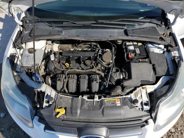 Photo 11 from auction – 2014 FORD FOCUS S with VIN 1FADP3E24EL171029