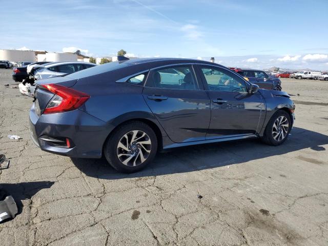 Photo 3 from auction – 2018 HONDA CIVIC EX with VIN 2HGFC2F70JH571732
