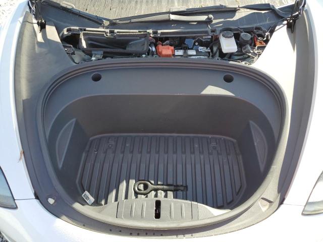 Photo 11 from auction – 2021 TESLA MODEL 3 with VIN 5YJ3E1EA4MF100700