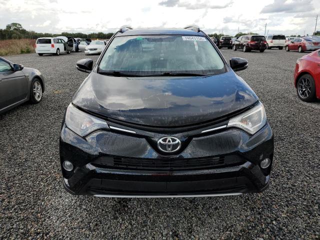 Photo 5 from auction – 2016 TOYOTA RAV4 XLE with VIN 2T3RFREVXGW422443