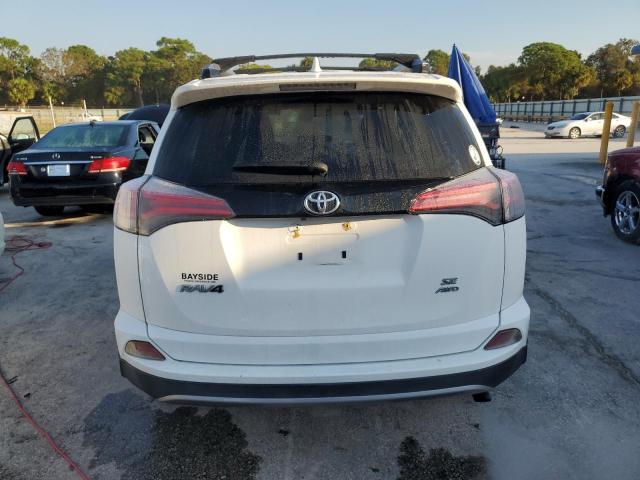 Photo 6 from auction – 2018 TOYOTA RAV4 SE with VIN JTMJFREV3JD252590