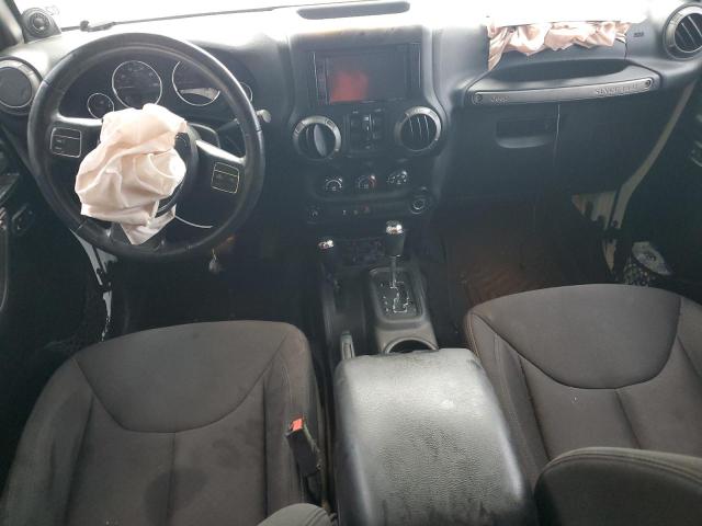 Photo 8 from auction – 2014 JEEP WRANGLER U with VIN 1C4BJWDG1EL223816