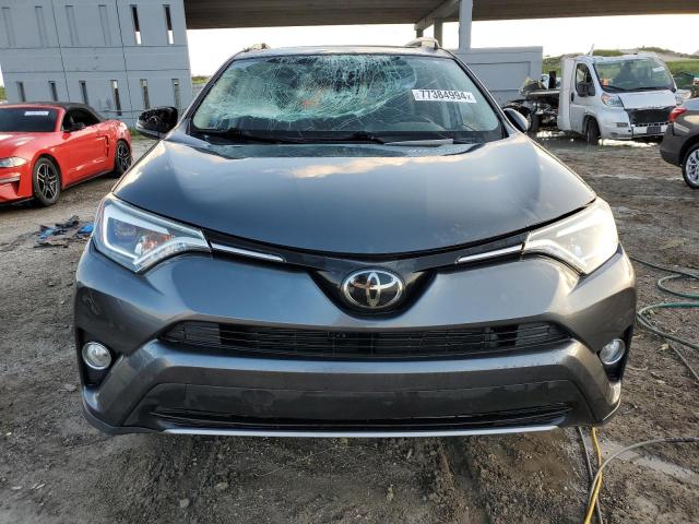 Photo 5 from auction – 2018 TOYOTA RAV4 LIMIT with VIN JTMYFREV1JD116540