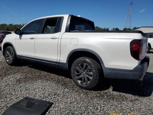 Photo 2 from auction – 2021 HONDA RIDGELINE with VIN 5FPYK3F19MB009521