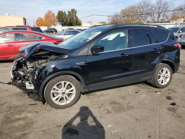 FORD ESCAPE SE 2018 with VIN 1FMCU0GD6JUC00400 - Photo from auction