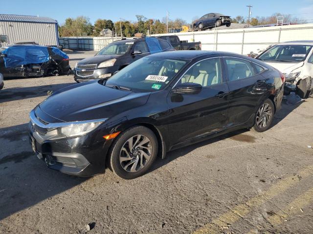 HONDA CIVIC EX 2016 with VIN 2HGFC2F72GH518023 - Photo from auction