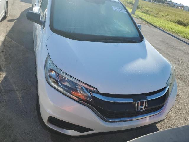 Photo 5 from auction – 2015 HONDA CR-V LX with VIN 5J6RM4H33FL038776