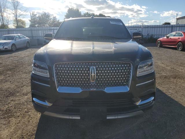 Photo 5 from auction – 2021 LINCOLN NAVIGATOR with VIN 5LMJJ2LT0MEL08497