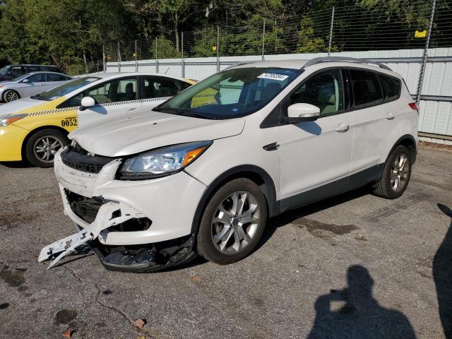 FORD ESCAPE TIT 2016 with VIN 1FMCU0JX3GUB11296 - Photo from auction