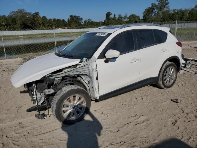 Photo 1 from auction – 2013 MAZDA CX-5 TOURI with VIN JM3KE2CEXD0140860