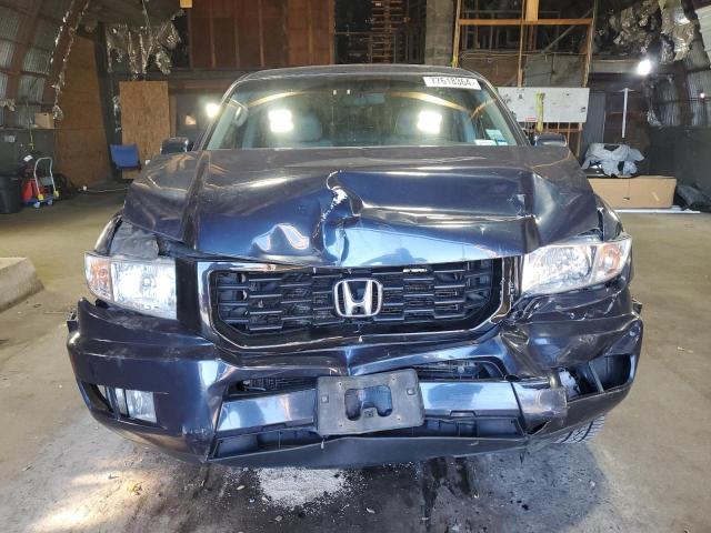 Photo 5 from auction – 2011 HONDA RIDGELINE with VIN 5FPYK1F58BB454689