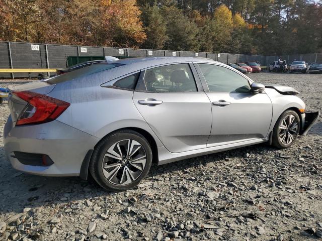 Photo 3 from auction – 2018 HONDA CIVIC EX with VIN JHMFC1F3XJX017520