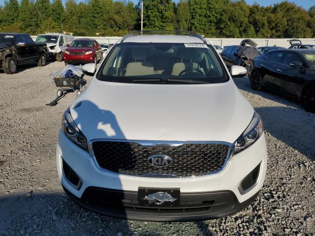 Photo 5 from auction – 2016 KIA SORENTO LX with VIN 5XYPG4A31GG099281