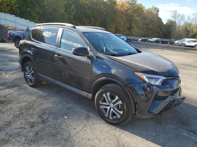 Photo 4 from auction – 2018 TOYOTA RAV4 LE with VIN 2T3BFREV6JW835355