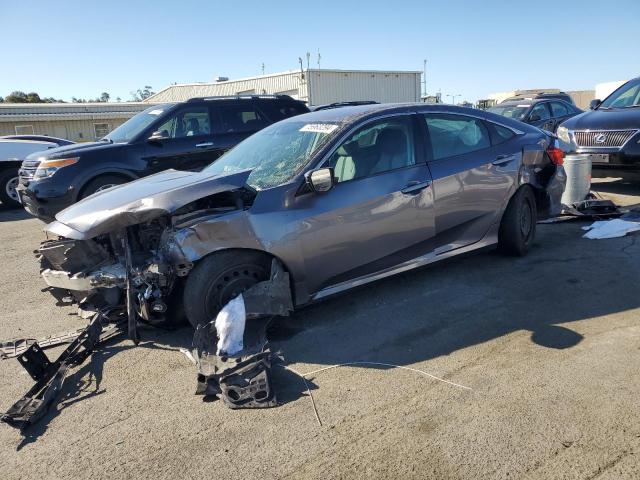 HONDA CIVIC LX 2019 with VIN 19XFC2F63KE200311 - Photo from auction