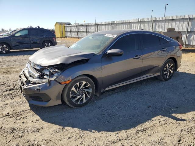 HONDA CIVIC EX 2017 with VIN 19XFC2F72HE222804 - Photo from auction