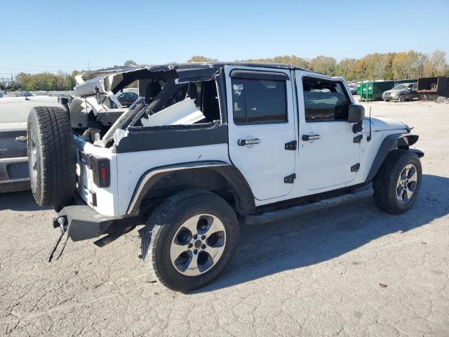 Photo 3 from auction – 2013 JEEP WRANGLER U with VIN 1C4BJWDG9DL700605