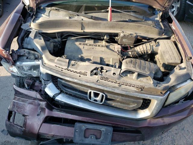 Photo 11 from auction – 2010 HONDA RIDGELINE with VIN 5FPYK1F25AB004762