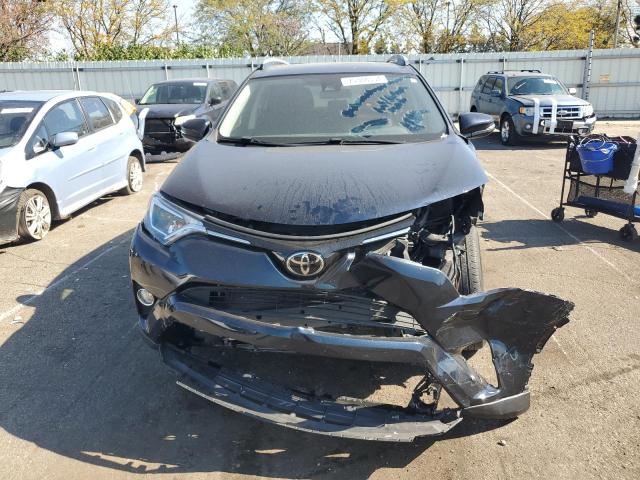 Photo 5 from auction – 2017 TOYOTA RAV4 XLE with VIN JTMWFREV9HJ713728