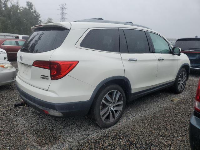Photo 3 from auction – 2017 HONDA PILOT TOUR with VIN 5FNYF6H90HB035688