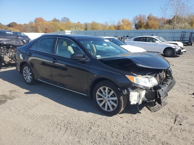 Photo 4 from auction – 2014 TOYOTA CAMRY L with VIN 4T4BF1FK2ER429938