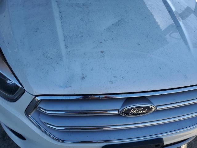 Photo 11 from auction – 2019 FORD ESCAPE TIT with VIN 1FMCU9J97KUB11932