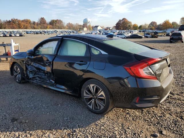 Photo 2 from auction – 2018 HONDA CIVIC EX with VIN JHMFC1F31JX020337
