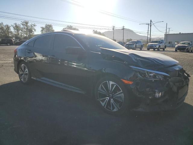 Photo 4 from auction – 2017 HONDA CIVIC EX with VIN 2HGFC1F33HH632248