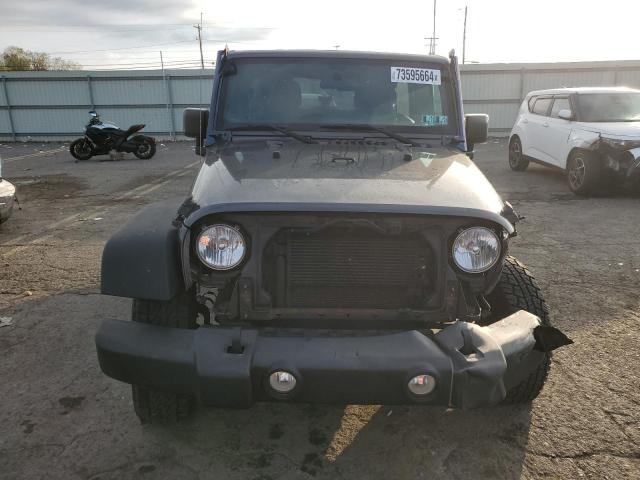 Photo 5 from auction – 2016 JEEP WRANGLER U with VIN 1C4BJWDG5GL306216