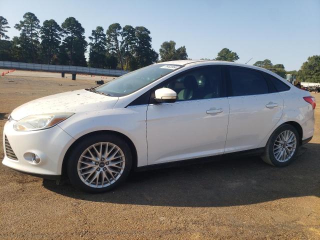 FORD FOCUS SEL 2012 with VIN 1FAHP3H22CL402987 - Photo from auction
