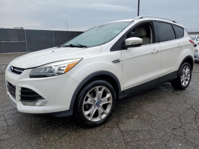 FORD ESCAPE TIT 2014 with VIN 1FMCU0JX0EUE56315 - Photo from auction