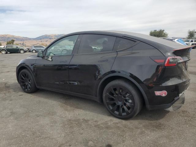 Photo 2 from auction – 2023 TESLA MODEL Y with VIN 7SAYGDEE4PA163076