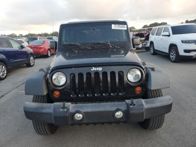 Photo 5 from auction – 2013 JEEP WRANGLER U with VIN 1C4BJWDG4DL652849