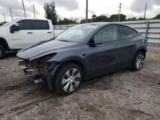 TESLA MODEL Y 2023 with VIN 7SAYGDEE4PF870018 - Photo from auction