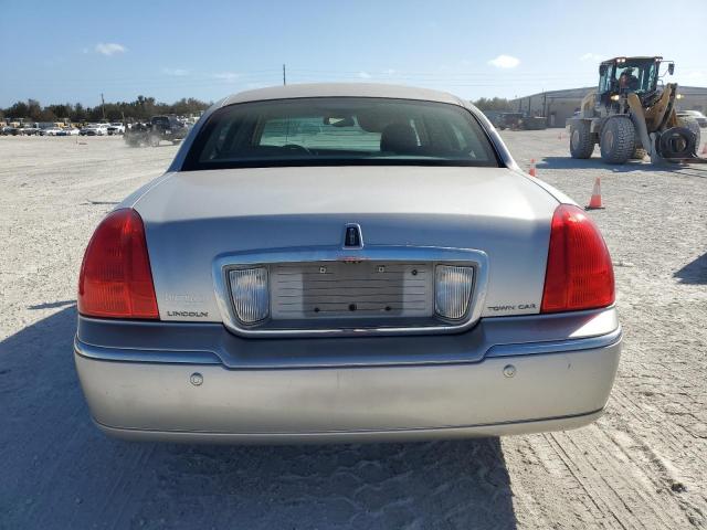 Photo 6 from auction – 2004 LINCOLN TOWN CAR U with VIN 1LNHM83W64Y660553