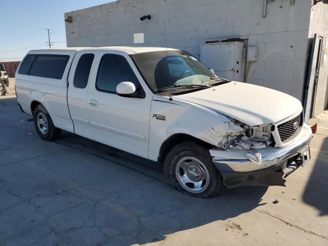 Photo 4 from auction – 2003 FORD F150 with VIN 1FTRX17213KA53976