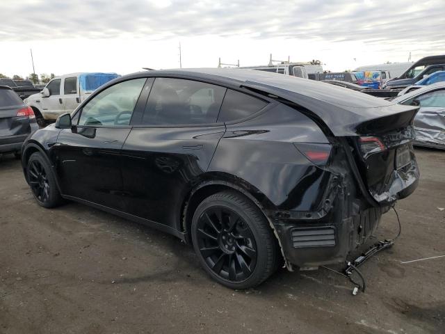 Photo 2 from auction – 2022 TESLA MODEL Y with VIN 7SAYGAEE7NF573563