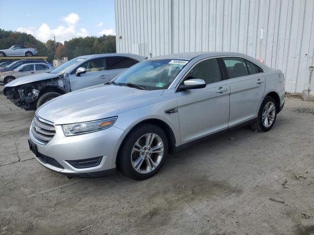 FORD TAURUS SEL 2013 with VIN 1FAHP2E80DG118836 - Photo from auction
