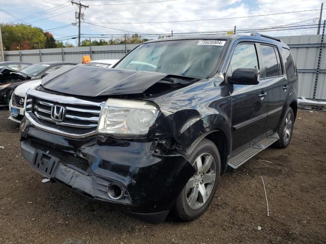 HONDA PILOT TOUR 2014 with VIN 5FNYF4H95EB015338 - Photo from auction
