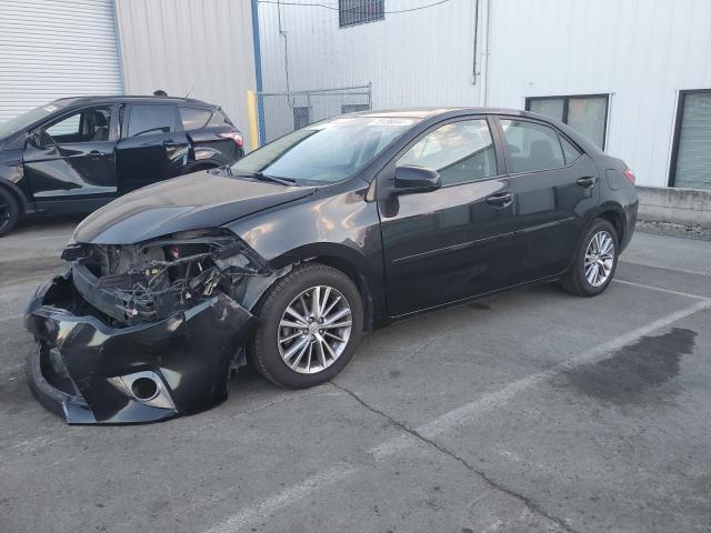 TOYOTA COROLLA L 2015 with VIN 2T1BURHE4FC403849 - Photo from auction