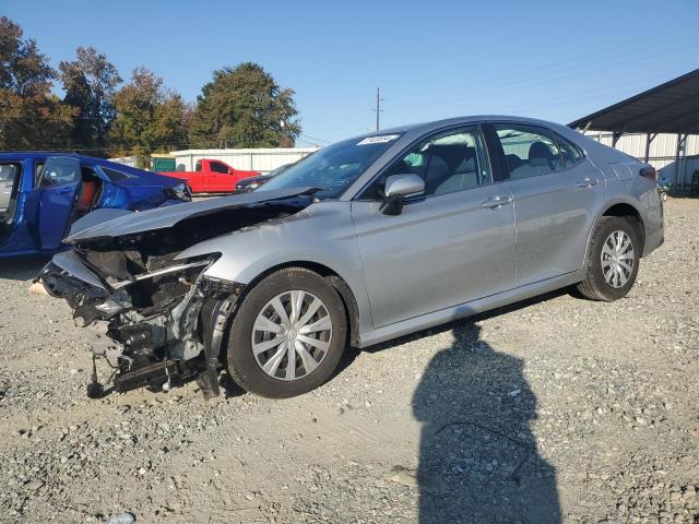 TOYOTA CAMRY LE 2023 with VIN 4T1C31AK3PU054059 - Photo from auction
