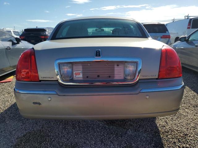 Photo 6 from auction – 2004 LINCOLN TOWN CAR E with VIN 1LNHM81W64Y635400