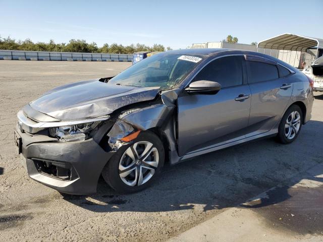 HONDA CIVIC LX 2018 with VIN 2HGFC2F56JH524705 - Photo from auction